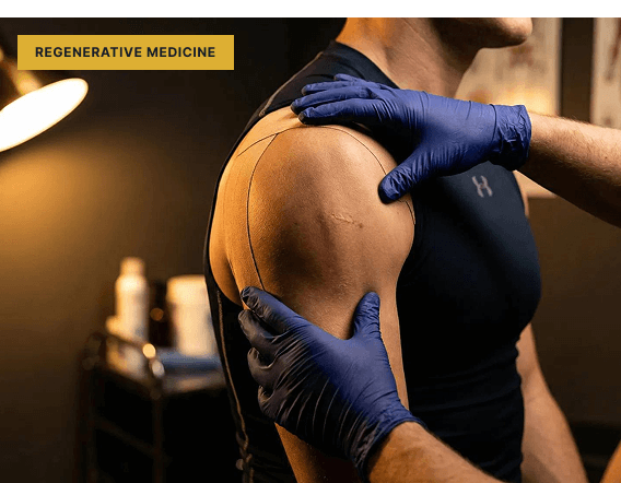 Person receiving regenerative medicine treatment on shoulder, highlighting therapeutic approach for skin health and healing related to AH Clinics' Glow Peptide.